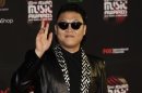 South Korean pop singer Psy poses on the red carpet as he attends the Mnet Asian Music Awards in Hong Kong