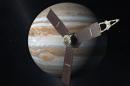 FILE - This 2010 artist's rendering depicts NASA's Juno spacecraft with Jupiter in the background. NASA's Jupiter-bound spacecraft will swing by Earth for one last visit Wednesday Oct. 9, 2013 before speeding to the outer solar system. Wednesday's flyby allows the Juno spacecraft to gather the momentum it needs to arrive at Jupiter in 2016. (AP Photo/NASA/JPL, File)