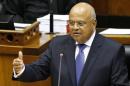 South Africa's Finance Minister Gordhan delivers his 2014 budget address in Parliament in Cape Town