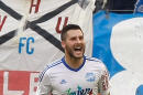 Marseille's French forward Andre-Pierre Gignac, celebrates after scoring against Toulouse, during their League One soccer match, at the Velodrome Stadium, in Marseille, southern France, Sunday, Oct. 19, 2014. (AP Photo/Claude Paris)