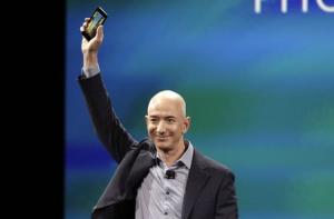 Amazon CEO Jeff Bezos shows off his company&#39;s new smartphone, the Fire Phone, in Seattle, Washington