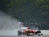 Alonso clocked a best time of one minute and 32.167 seconds in intermittent sunshine at a sodden Silverstone