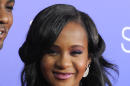 In this Aug. 16, 2012, file photo, Bobbi Kristina Brown attends the Los Angeles premiere of "Sparkle" at Grauman's Chinese Theatre in Los Angeles. Messages of support were being offered Monday, Feb. 2, 2015, as people awaited word on Brown, who authorities say was found face down and unresponsive in a bathtub over the weekend in a suburban Atlanta home. (Photo by Jordan Strauss/Invision/AP, File)