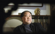 In this photo taken on Tuesday, Dec. 27, 2005, Chinese writer Mo Yan listens during an interview in Beijing, China. Mo was awarded the Nobel Prize in literature during a ceremony in Sweden on Thursday, Oct. 11, 2012. (AP Photo) CHINA OUT