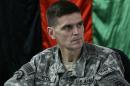 FILE - In this Feb. 24, 2007, file photo, then-U.S. Brig. Gen. Joseph Votel listens in front of an Afghan national flag during a meeting with Afghan officials in an Afghan military base in Kabul, Afghanistan. A senior U.S. defense official says President Barack Obama is expected to choose Army Gen. Joseph Votel, commander of U.S. Special Operations Command, to succeed Army Gen. Lloyd Austin. (AP Photo/Musadeq Sadeq, File)