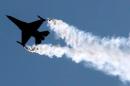A U.S. LOCKHEED MARTIN F-16 FLIES DURING AN AIR DISPLAY AT THE FARNBOROUGH INTERNATIONAL AIR SHOW.