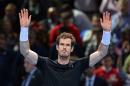 Britain's Andy Murray waves to the crowd after beating David Ferrer at the ATP World Tour Finals in London on November 16, 2015