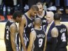Spurs coach Popovich speaks to his players near the end of the fourth quarter against the Heat in Game 6 of their NBA Finals basketball playoff in Miami