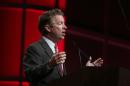 Kentucky Senator Rand Paul talks to attendees at the National Urban League Annual Conference in Cincinnati Friday July 25, 2014. (AP Photo/Tom Uhlman)
