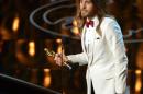 Jared Leto accepts the award for best actor in a supporting role for 
