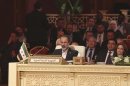 Moaz Alkhatib, head of the Syrian National Coalition, attends the Arab League summit in Doha