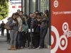 In this Thursday, Jan. 10, 2013, photo, hundreds of prospective candidates await their turn to apply for job openings at a Target job fair in Los Angeles. Target reports its quarterly earnings on Wednesday, May 22, 2013. (AP Photo/Damian Dovarganes)