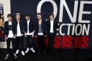 Members of British boy band One DIrection arrive for the premiere of their documentary film "This is Us" in New York