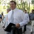 Former Major League Baseball pitcher Roger Clemens, accompanied by his attorney Rusty Hardin, left, arrives at federal court in Washington, Monday, June 11, 2012, for his perjury trial. (AP Photo/Haraz N. Ghanbari)
