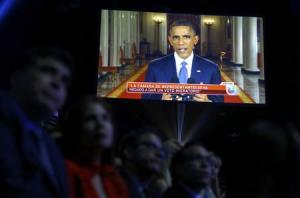 U.S. President Barack Obama is shown on a large screen&nbsp;&hellip;