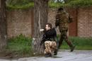 Armed pro-Russian activists take positions in Luhansk