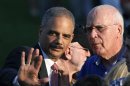 U.S. Attorney General Eric Holder and Chairman of the Senate Judiciary Committee Sen. Patrick Leahy talk at the White House during a picnic for Members of Congress in Washington