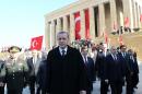 Turkish President Tayyip Erdogan (C) attends a ceremony at the mausoleum of Mustafa Kemal Ataturk on November 10, 2014 in Ankara