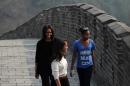 US First Lady Michelle Obama and her daughters visit the Great Wall at Mutianyu, northeast of Beijing, on March 23, 2014