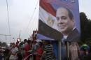 Egyptians celebrate after swearing-in ceremony of President elect al-Sissi in Cairo