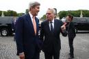 US Secretary of State John Kerry (left) flew to Moscow after attending the Bastille Day parade on the Champs Elysees in Paris, on July 14, 2016