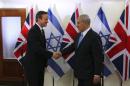 British Prime Minister Cameron shakes hands with his Israeli counterpart in Jerusalem