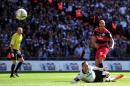 QPR's English striker Bobby Zamora scores the winning goal during the English Championship Play Off final football match between Derby County and Queens Park Rangers at Wembley Stadium in London on May 24, 2014