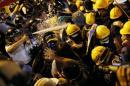 Police use pepper spray during clashes with pro-democracy protesters close to the chief executive office in Hong Kong