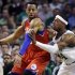 Philadelphia 76ers forward Andre Iguodala, left, posts up on Boston Celtics forward Paul Pierce (34) during the first quarter of Game 1 in the NBA basketball Eastern Conference semifinal playoff series, Saturday, May 12, 2012, in Boston. (AP Photo/Elise Amendola)
