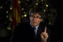 Catalonia's regional president, Carles Puigdemont speaks during an interview with The Associated Press in Barcelona, Spain, on Friday, Dec. 16, 2016. Puigdemont plans to go ahead with a new referendum on independence by September despite a ruling by Spain's Constitutional Court banning the vote. (AP Photo/Emilio Morenatti)