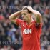 Manchester United's Ferdinand reacts after a missed opportunity during their English Premier League soccer match against Everton in Manchester