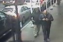 This still image made from a video provided by the New York City Police Department shows the gunman, left, behind Brandon Lincoln Woodard pulling the weapon from his jacket pocket a moment before the shooting, Mon. Dec. 10, 2012 in New York. A security camera photo shows a man pulling a weapon from his pocket moments before police say he shot a Los Angeles man in midtown Manhattan. The NYPD released the photo Tuesday amid a manhunt for the unidentified suspect in the execution-style slaying (Ap Photo/New York Police Department/ HO)