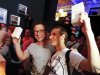 Customers pose for the media after they were first in line to buy Samsung Electronics' new Samsung Galaxy SIII smartphones during a late night sale event in Berlin