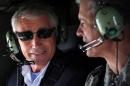 U.S. Secretary of Defense Chuck Hagel, left, talks to Commander of U.S. Force Japan Lt. Gen. Salvatore "Sam" Angelella during a helicopter ride Saturday, April 5, 2014 from Yokota Air Force Base in Fussa, to Tokyo in Japan. Hagel is on an Asian trip, the fourth since he took office, to Japan, China and Mongolia. (AP Photo/Alex Pool, Pool)