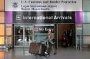 International travelers arrive after U.S. President Donald Trump's executive order travel ban at Logan Airport in Boston