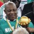 Nigeria's coach Stephen Keshi reacts as he holds the trophy after their African Nations Cup (AFCON 2013) final soccer match victory against Burkina Faso in Johannesburg