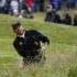 Jeev Milkha Singh watches his shot from the rough during the second round of the British Open golf championship at Royal Lytham & St Annes