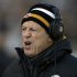 FILE - In this Dec. 23, 2012, file photo, Pittsburgh Steelers defensive coordinator Dick LeBeau talks to his defense during the first quarter of an NFL football game against the Cincinnati Bengals in Pittsburgh. The 75-year-old LeBeau has every intention of returning in 2013 for what would be a 55th consecutive season in the NFL. (AP Photo/Gene J. Puskar, File)