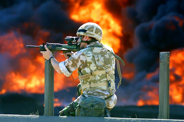 A member of the British Desert Rats during fighting on the outskirts of the Iraqi city of Basra