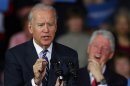 Former president Bill Clinton laughs as Vice President Joe Biden speaks during a campaign rally at the Covelli Centre, Monday, Oct. 29, 2012, in Youngstown, Ohio. (AP Photo/Matt Rourke)