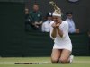 Sabine Lisicki of Germany reacts winning against Maria Sharapova of Russia during a fourth round single match at the All England Lawn Tennis Championships at Wimbledon, England, Monday, July 2, 2012. (AP Photo/Sang Tan)