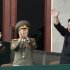 FILE - In this April 14, 2012 file photo, North Korean leader Kim Jong Un, right, waves as North Korean military officers clap during a mass meeting of North Korea's ruling party at a stadium in Pyongyang, North Korea. North Korean state media made the announcement Wednesday, July 18, 2012 in a special bulletin that Kim has been promoted to marshal, the military's highest rank. (AP Photo/Ng Han Guan, File)