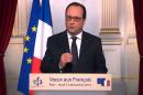 A videograb made on December 31, 2015 in Paris shows French President Francois Hollande delivering his New Year's wishes