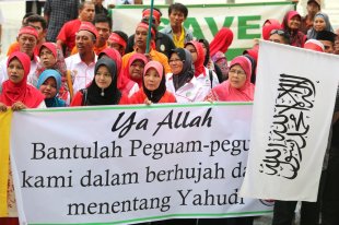 Another Muslim group, Ikatan Muslimin Malaysia, told Christians yesterday to emigrate if they could not accept the sovereignty of Islam and the king in Malaysia.
