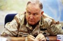 FILE - In this Sept. 14, 1990 file photo, U.S. Army Gen. H. Norman Schwarzkopf, commander of U.S. forces in Saudi Arabia, answers questions during an interview in Riyadh. A memorial service for the Desert Storm commander famously nicknamed 
