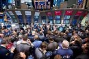 Traders gather for the IPO of Tumi Holdings Inc. on the floor of the New York Stock Exchange