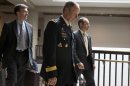 Gen. Keith Alexander, Director of the National Security Agency, center, leaves a Senate Intelligence Committee meeting regarding NSA programs, in Washington, Thursday, June 13, 2013. (AP Photo/Jacquelyn Martin)