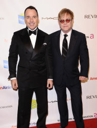 David Furnish, left, and Elton John attend the Elton John AIDS Foundation 10th Annual Enduring Vision Benefit, on Wednesday, Oct. 26, 2011, in New York. (AP Photo/Peter Kramer)