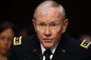 Chairman of the Joint Chiefs General Martin Dempsey testifies at a Senate Armed Services Committee in Washington