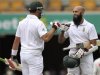South Africa's Amla celebrates his century against Australia with his teammate Kallis during the first cricket test match at the Gabba in Brisbane